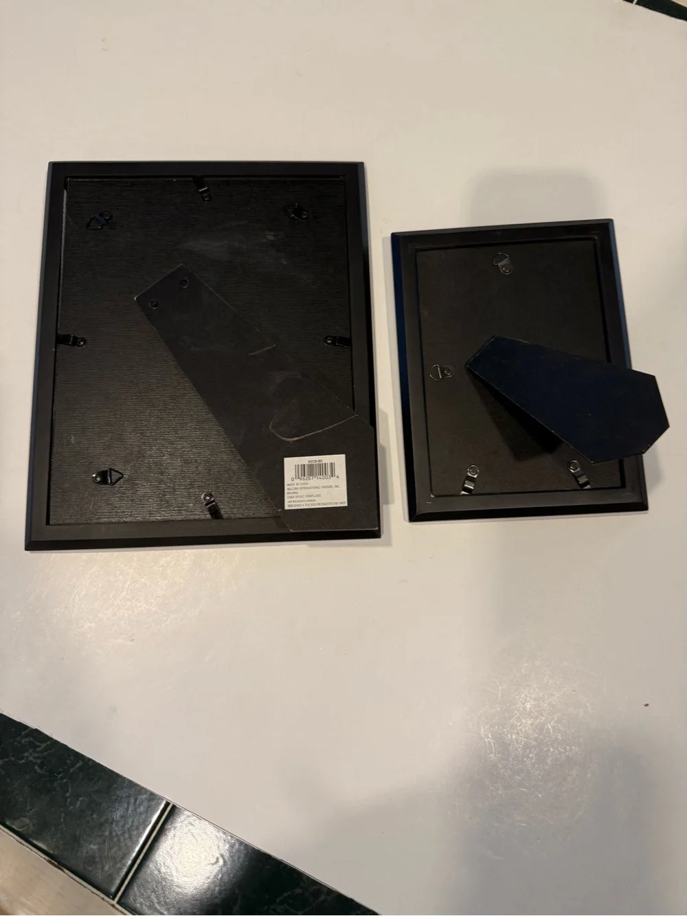 SET OF TWO BLACK PICTURE FRAMES ONE 8x10- ONE 5x7